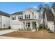 Well-maintained home boasting a covered front porch and lush landscaping at 491 Richfield Way, Summerville, SC 29486