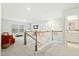Upstairs loft area provides a flexible living space with carpet and ample natural light at 491 Richfield Way, Summerville, SC 29486