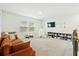 Versatile carpeted loft area provides additional living space with TV, play area, and comfortable seating at 491 Richfield Way, Summerville, SC 29486