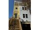 Stylish three-story home featuring an inviting entrance staircase and attached garage at 515 Joseph St, Charleston, SC 29412