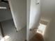 Hallway leading to rooms with stairs down, freshly painted at 515 Joseph St, Charleston, SC 29412