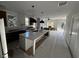 Spacious kitchen featuring a large center island, stainless appliances, and ample natural light at 515 Joseph St, Charleston, SC 29412