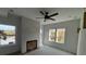 Bright living room with a modern fireplace feature and large windows offering scenic views at 515 Joseph St, Charleston, SC 29412