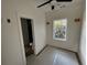 Empty room featuring small window with view to the backyard and open door to bathroom at 515 Joseph St, Charleston, SC 29412