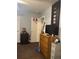 Cozy bedroom featuring a wooden dresser, a wall-mounted TV, and an indoor basketball hoop on the door at 527 Travelers Blvd, Summerville, SC 29485