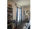 Bedroom featuring a cozy window area, an open closet and a nightstand with a lamp at 527 Travelers Blvd, Summerville, SC 29485