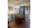 Cozy dining area featuring a wooden table, comfortable chairs, and soft lighting, perfect for Gathering meals at 527 Travelers Blvd, Summerville, SC 29485
