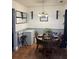 Cozy dining area featuring a round wood table and chairs under an elegant chandelier at 527 Travelers Blvd, Summerville, SC 29485