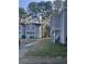 Exterior view of charming home with a lawn and manicured landscaping, located in a Gathering-friendly community at 527 Travelers Blvd, Summerville, SC 29485