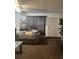 Inviting living room with neutral-toned sofas, soft lighting, and tasteful decorations, creating a cozy ambiance at 527 Travelers Blvd, Summerville, SC 29485