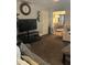 Open-concept living area featuring a large TV, dining space, and comfortable seating for relaxation and entertainment at 527 Travelers Blvd, Summerville, SC 29485