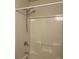 Close-up of the shower and faucet hardware with white walls and trim at 527 Travelers Blvd, Summerville, SC 29485