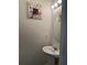 Small bathroom featuring a pedestal sink, art, and stylish lighting at 531 Travelers Blvd, Summerville, SC 29485