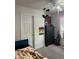 This bedroom contains a black dresser, a bed, a lamp picture, and LED lights around the window at 531 Travelers Blvd, Summerville, SC 29485