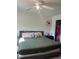 Bedroom showcasing natural light, ceiling fan, and a green comforter at 531 Travelers Blvd, Summerville, SC 29485
