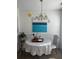 Stylish dining room with a chandelier, elegant table setting, and tasteful decor at 531 Travelers Blvd, Summerville, SC 29485