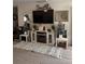Cozy living room featuring a fireplace, entertainment center and elegant decor at 531 Travelers Blvd, Summerville, SC 29485