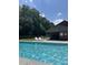 Community pool with lounge chairs for relaxing on a sunny day at 531 Travelers Blvd, Summerville, SC 29485