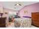 Serene bedroom featuring a comfortable bed, ample natural light, and coordinated furnishings at 600 Elm Hall Cir, Summerville, SC 29483