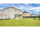 Spacious backyard features a shed, patio, and play set for outdoor enjoyment at 619 Ravens Wood Rd, Summerville, SC 29486