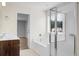 Bathroom includes a separate shower, tub, double sink vanity, and a neutral color palette at 619 Ravens Wood Rd, Summerville, SC 29486