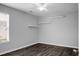 Clean bedroom with neutral walls, ceiling fan and modern floating shelves at 619 Ravens Wood Rd, Summerville, SC 29486