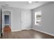 Light-filled bedroom featuring hardwood flooring and neutral colored walls at 619 Ravens Wood Rd, Summerville, SC 29486