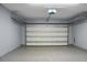 View of the garage featuring an automatic door and plenty of storage space at 619 Ravens Wood Rd, Summerville, SC 29486