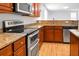 Close up shot of the kitchen featuring granite countertops and stainless steel appliances at 619 Ravens Wood Rd, Summerville, SC 29486