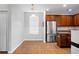 Modern kitchen boasts stainless steel appliances, granite countertops, and wood cabinets for a culinary experience at 619 Ravens Wood Rd, Summerville, SC 29486