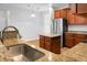 Bright kitchen featuring granite countertops, stainless steel appliances, and a kitchen island at 619 Ravens Wood Rd, Summerville, SC 29486