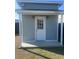Backyard storage shed with a covered porch, offering secure space for tools, equipment, and lawn furniture at 619 Ravens Wood Rd, Summerville, SC 29486