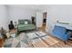 Cozy bedroom with hardwood floors, desk, and a metal bed frame at 620 Baytree Ct, Mount Pleasant, SC 29464