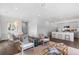 Spacious living area with open floor plan, seamlessly connecting the kitchen and dining spaces at 621 Red Monarch Way, Moncks Corner, SC 29461
