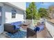 Inviting back patio featuring a cozy seating area with plush cushions and an outdoor rug at 677 Palisades Dr, Mount Pleasant, SC 29464