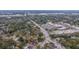 Expansive aerial view of a neighborhood showcasing the proximity to retail and green spaces at 69 Folly Road Blvd, Charleston, SC 29407
