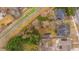 Birds eye view revealing a home's layout, neighboring landscapes, and pedestrian trail access at 69 Folly Road Blvd, Charleston, SC 29407