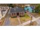 Well-maintained brick home with a neat yard at 69 Folly Road Blvd, Charleston, SC 29407