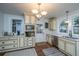 Bright kitchen with stainless steel appliances, lots of cabinets, and a door to the backyard at 69 Folly Road Blvd, Charleston, SC 29407