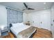 Cozy bedroom featuring hardwood floors, ceiling fan, and good sized closet at 69 Folly Road Blvd, Charleston, SC 29407