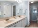 Bathroom featuring a double sink vanity and a large mirror, providing ample space at 8000 Palmetto Dr # 103-A, Isle of Palms, SC 29451