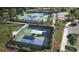 Aerial view of multiple community pickleball courts surrounded by greenery and parking at 960 Carnes Xing, Summerville, SC 29486