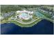 Aerial view of recreation center with pool, tennis courts, lake, landscaping, and parking at 1004 Tulip Shell, Summerville, SC 29485