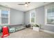 Bedroom featuring a bed, windows, fan, and closet at 119 Philips Park St, Summerville, SC 29486