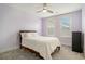 Bedroom featuring a bed, fan, carpet, and two windows at 119 Philips Park St, Summerville, SC 29486