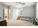 Bedroom featuring a bed, carpet, fan, window, and closet at 119 Philips Park St, Summerville, SC 29486