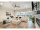 Inviting living room with fireplace, comfortable sectional sofa, and plenty of natural light at 119 Philips Park St, Summerville, SC 29486