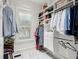 Well-organized walk-in closet featuring custom shelving and ample storage space at 121 Shipyard Rd, Mount Pleasant, SC 29464