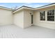 Exterior view of a deck off the back of the house, showing door and window trim at 1226 Pickens St, Hanahan, SC 29410