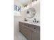 Bathroom with a double vanity, marble floors, and elegant lighting at 1226 Pickens St, Hanahan, SC 29410